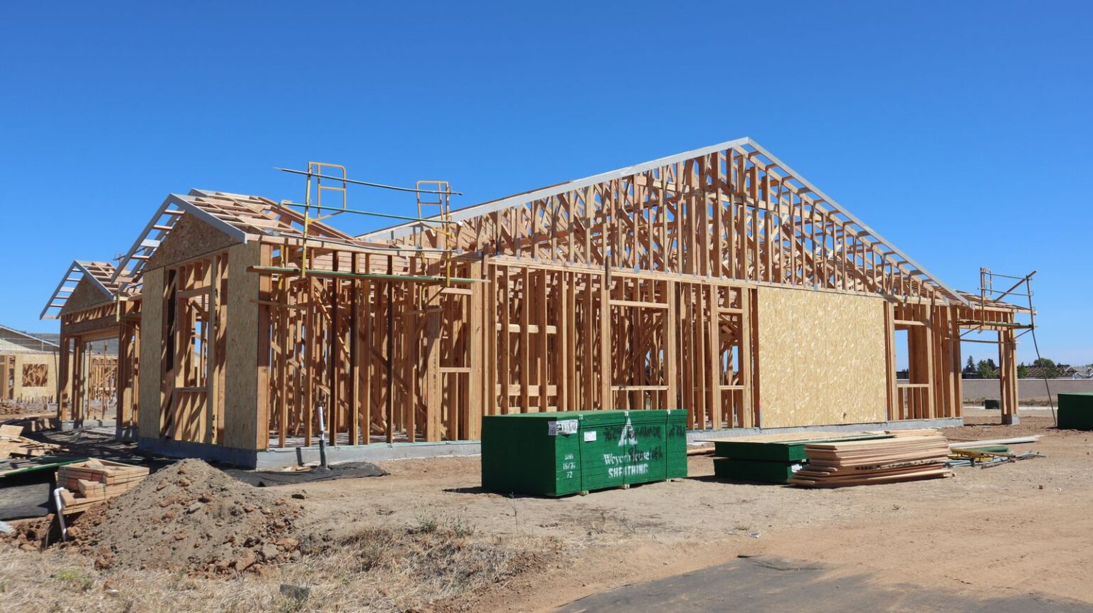 Wood framing for a new single-story building under construction (stock photo)